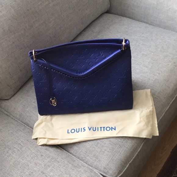 Handbags - 🦋 Louis Vuitton large blue leather bag. Original Price $2,500. Nice Copy!